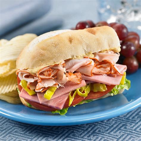 How much fat is in ham-turkey swiss mini sub with side salad - calories, carbs, nutrition